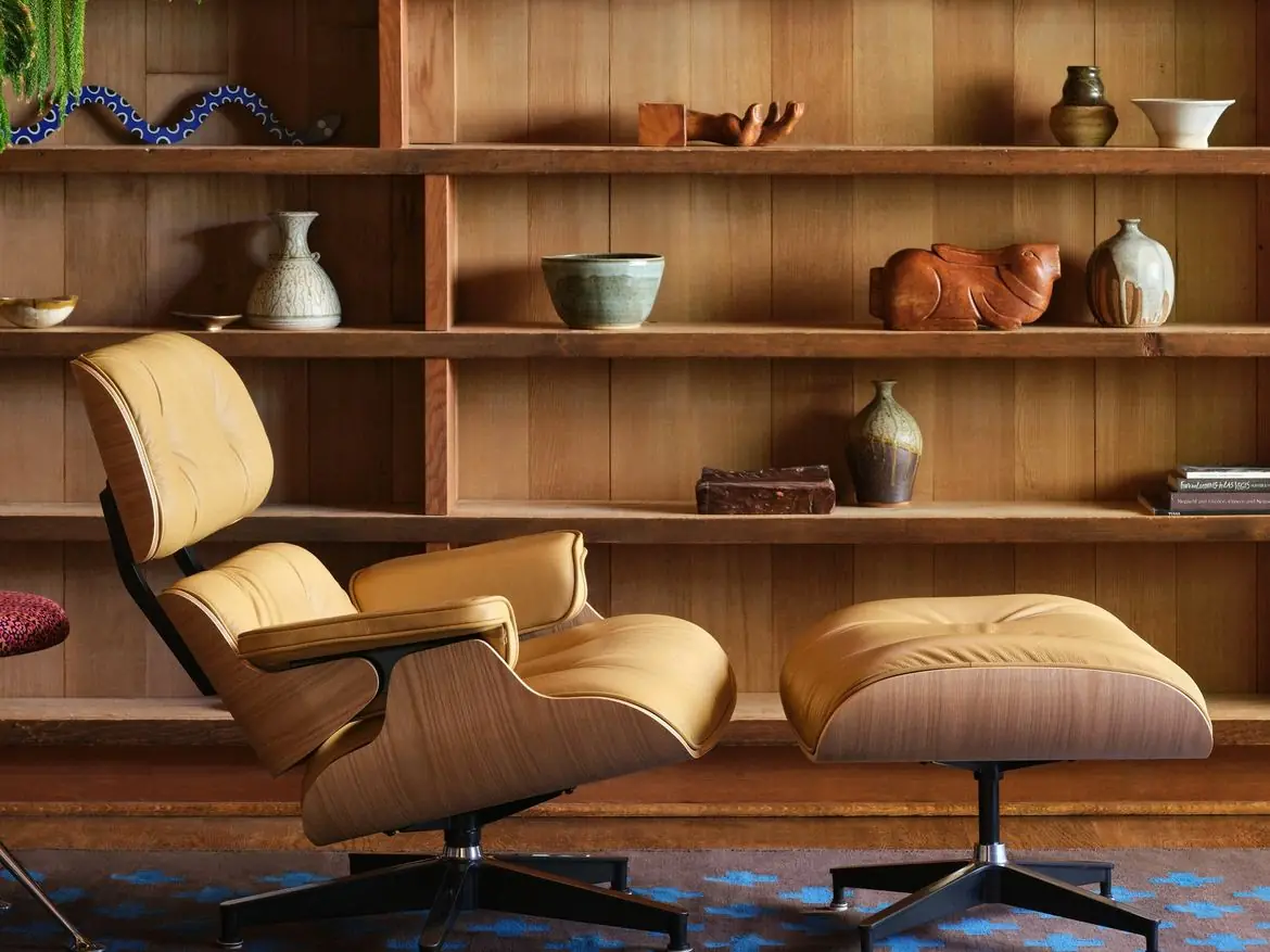 Eames Lounge Chair and Ottoman in a wood-panelled room